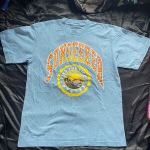 Oster Expedition Medium Tee in Light Blue with Black Print